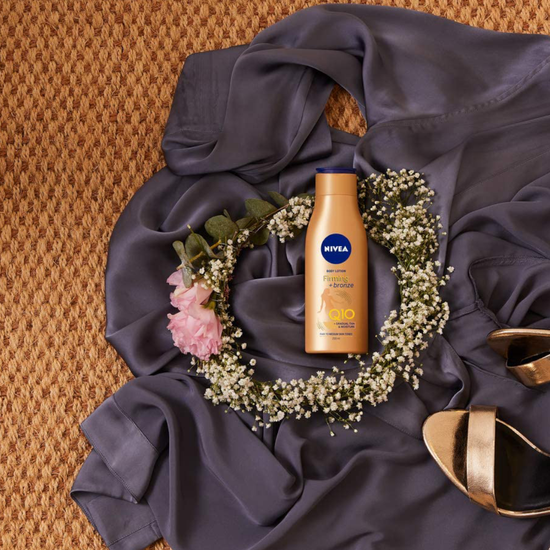 NIVEA Q10 Firming + Radiance Gradual Tan 400 ML NIVEA Q10 Firming + Radiance Gradual Tan 400 ML